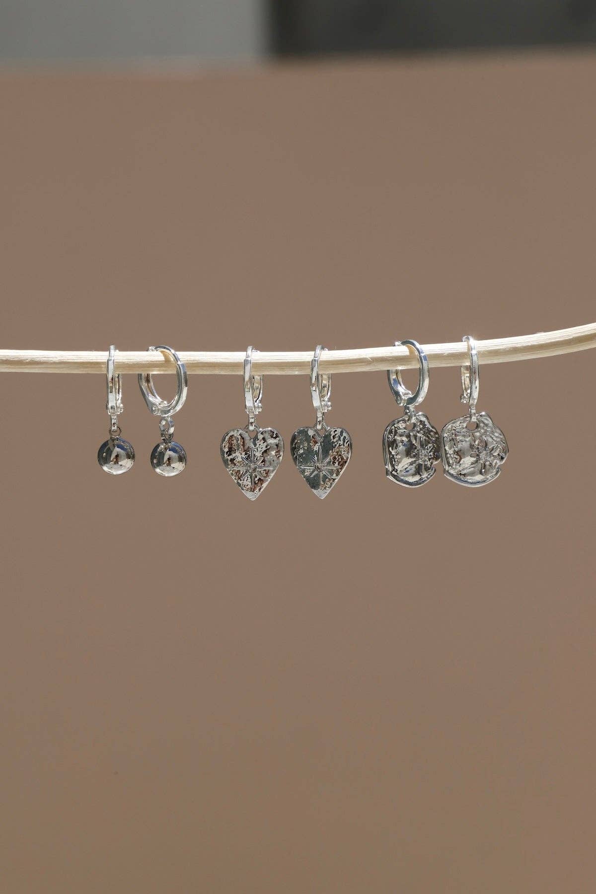 STARBURST HEART HUGGIES- silver