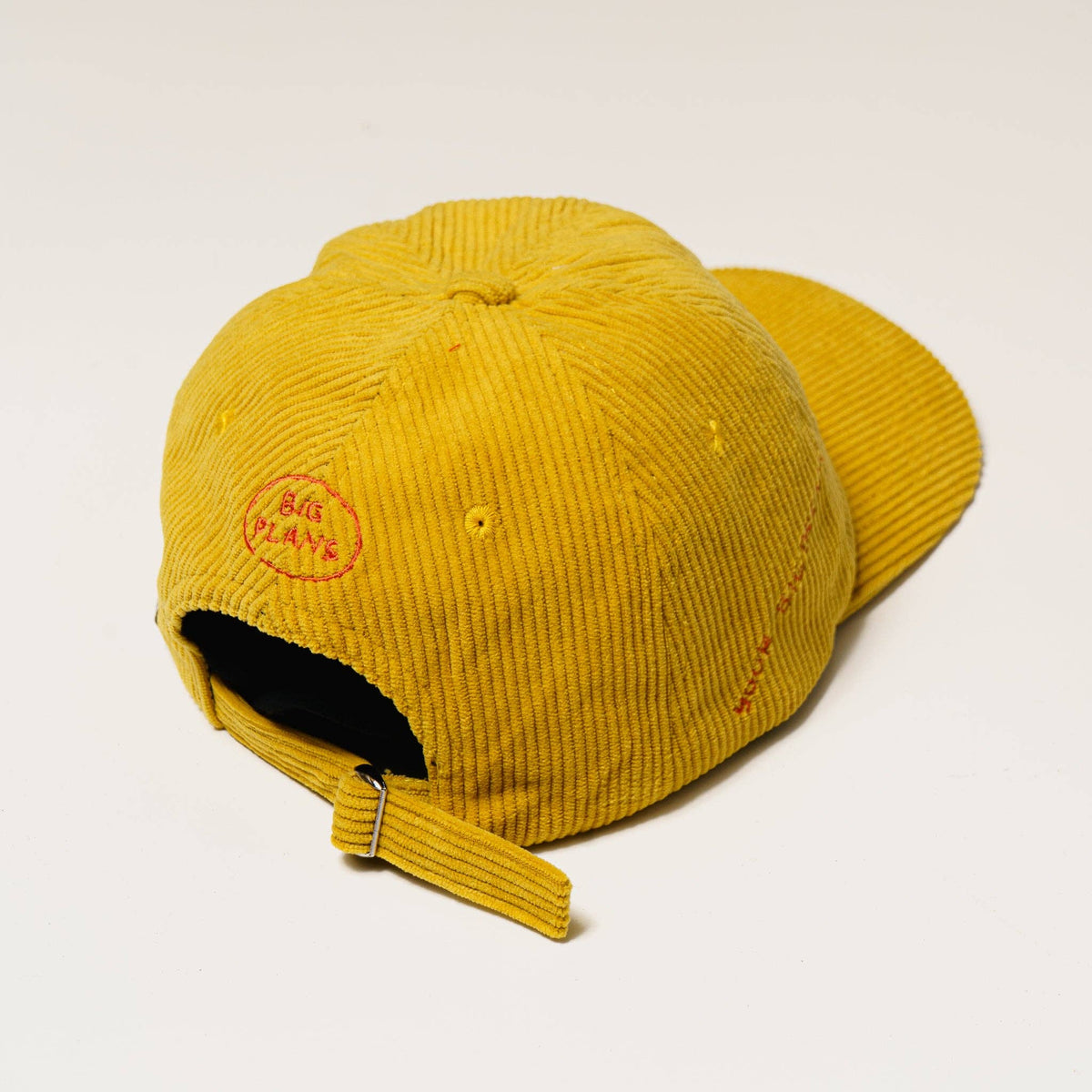 BIG PLANS: Yellow corduroy baseball cap