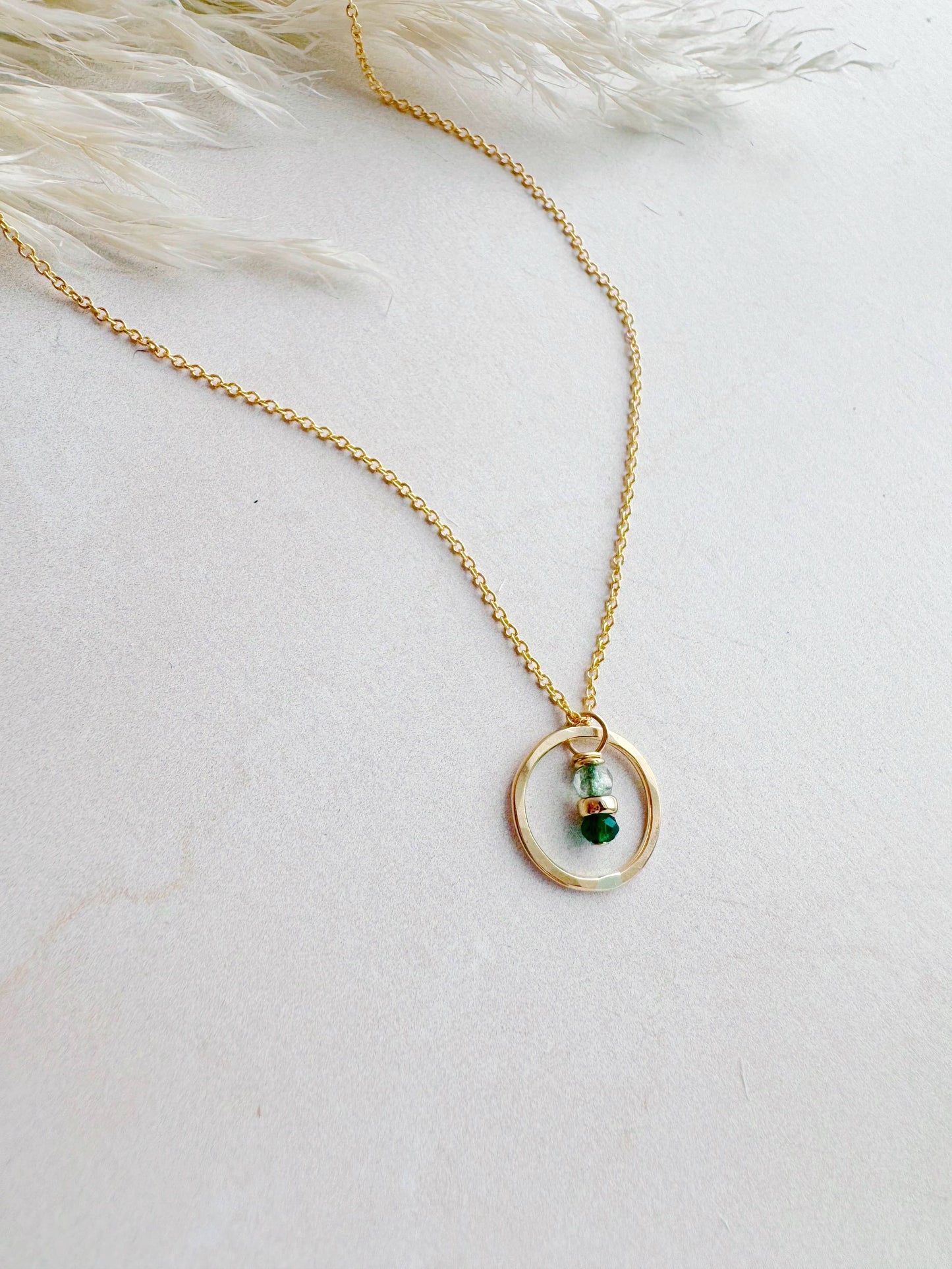Seedling Tiny Gold Circle Necklace with Green Crystals