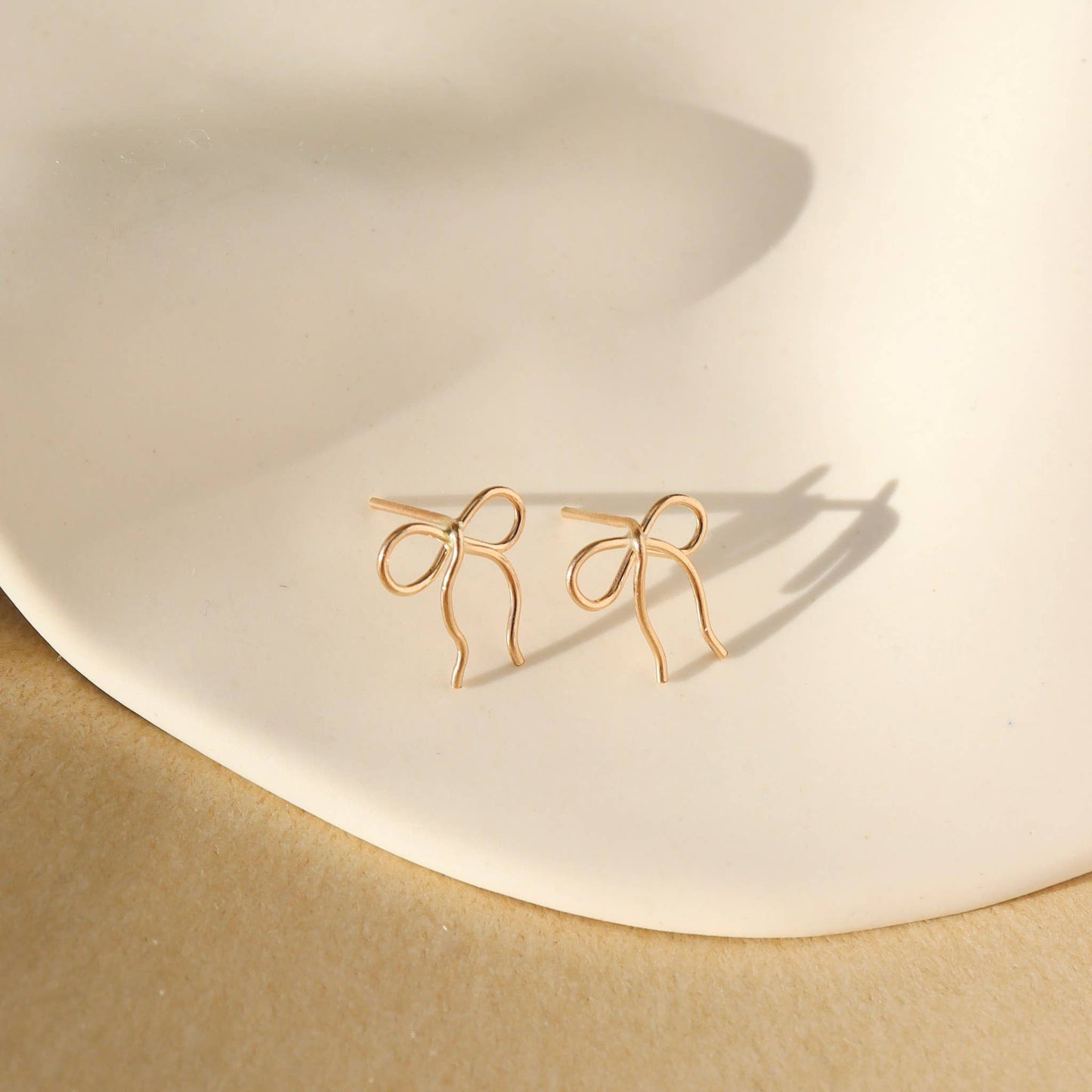 Mini Bow Studs in 14k Gold Fill