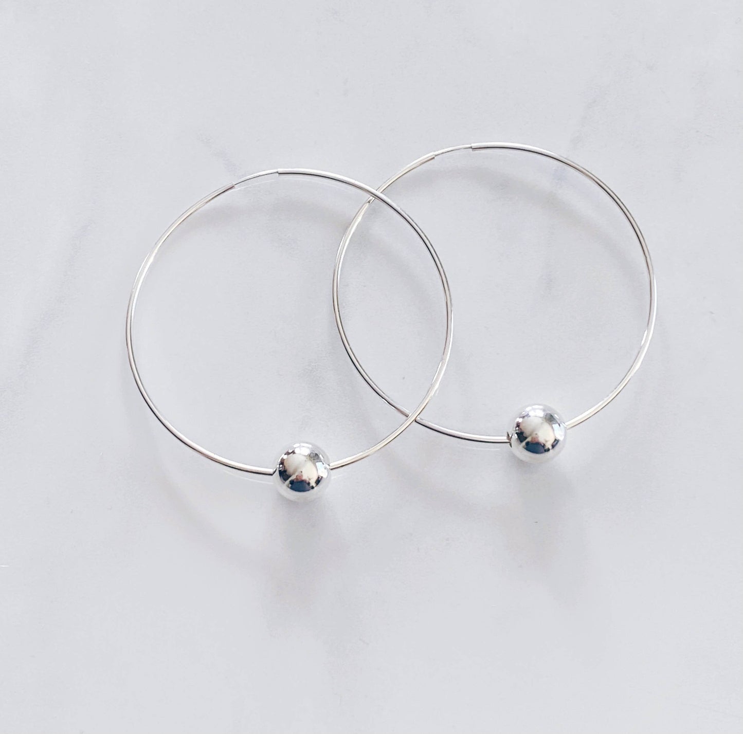 Large modern ball hoops | Sterling Silver